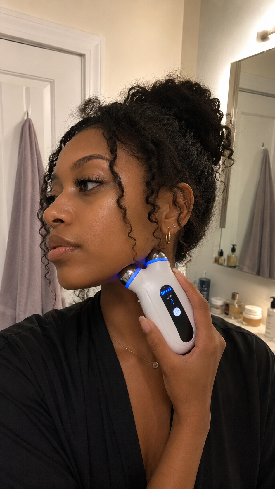 Customer using the Lumecūr microcurrent device at home